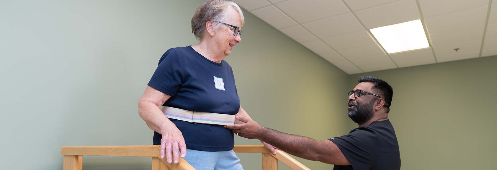 Female patient works with clinical staff