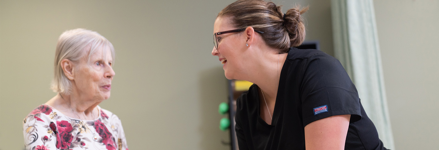 Patient and nurse talking